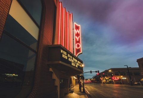 The iconic WYO Theater marquee illuminates the evening, a cultural hotspot and a top thing to do in Sheridan, WY.